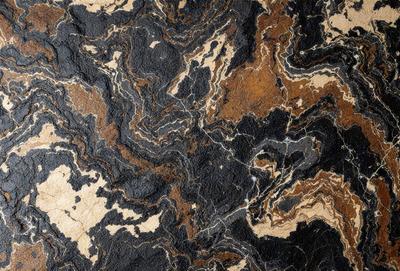The primary subject of the image is a close-up of a marble surface with a unique and intricate pattern. The setting is a rocky surface, possibly a stone or marble wall. The visual style appears to be a close-up of the marble, showcasing its texture and patterns. The colors and mood of the image are predominantly dark, with the marble surface being the main focus.