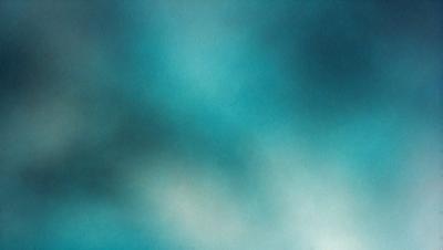 The primary subject of the image is a blue sky with clouds. The setting is a cloudy day, and the visual style is a photo. The dominant colors are blue and white, creating a calm and serene atmosphere.