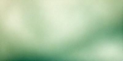 The primary subject of the image is a large, green, cloudy sky. The setting is a cloudy day, and the visual style is a natural, outdoor scene. The colors and mood of the image are predominantly green, with a slightly overcast atmosphere.