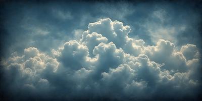 The primary subject of the image is a large, fluffy cloud in the sky. The cloud is surrounded by a blue sky, creating a serene and peaceful atmosphere. The setting is outdoors, with the cloud as the main focus of the scene. The visual style of the image is a photo, capturing the beauty of the cloud in its natural environment. The colors in the image are predominantly blue and white, with the cloud being predominantly white, and the sky being a deep blue.