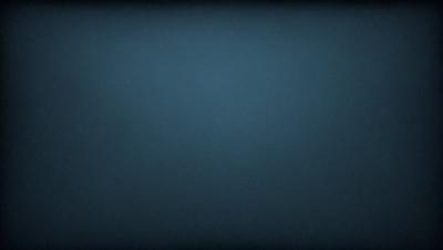 The primary subject of the image is a blue background. The setting is a dark, empty space with no visible objects or people. The visual style is a simple, monochromatic design. The colors and mood are predominantly dark and moody, with the blue background creating a sense of depth and mystery.