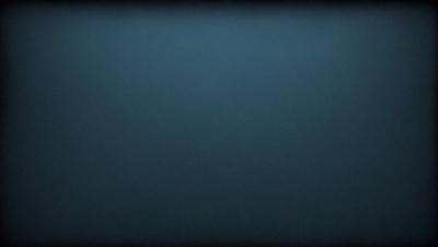 The primary subject of the image is a blue background. The setting is a dark, empty space with no visible objects or people. The visual style is a simple, monochromatic design. The colors and mood are predominantly dark and moody, with the blue background creating a sense of depth and mystery.