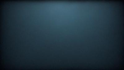 The primary subject of the image is a blue background. The setting is a dark, empty space with no visible objects or people. The visual style is a simple, monochromatic design. The colors and mood are predominantly dark and moody, with the blue background creating a sense of depth and mystery.