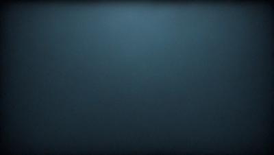 The primary subject of the image is a blue background. The setting is a dark, empty space with no visible objects or people. The visual style is a simple, monochromatic design. The colors and mood are predominantly dark and moody, with the blue background creating a sense of depth and mystery.