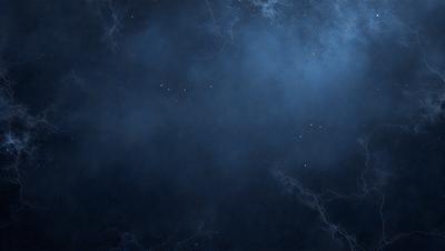 The primary subject of the image is the night sky, which is filled with stars. The setting is a dark, cloudy night, with the sky serving as the background. The visual style of the image is a photo, capturing the beauty of the night sky. The colors and mood of the image are predominantly dark and moody, with the stars providing a sense of depth and tranquility.