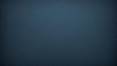 The primary subject of the image is a dark blue sky. The setting is a vast, open space with no visible landmarks or objects. The visual style is a simple, monochromatic image with no additional elements or textures. The colors and mood convey a sense of calmness and tranquility.