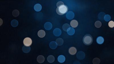 The primary subject of the image is a blue background with a pattern of white lights. The setting appears to be a nighttime scene, possibly a cityscape or a dark room with a light source. The visual style of the image is a combination of a photo and digital art, creating a unique and captivating atmosphere. The dominant colors are blue and white, with the white lights creating a sense of depth and contrast against the dark blue background.