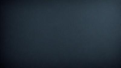 The primary subject of the image is a dark blue background. The setting is a black canvas, and the visual style is a simple, monochromatic design. The colors and mood of the image are predominantly dark and moody, creating a sense of depth and mystery.
