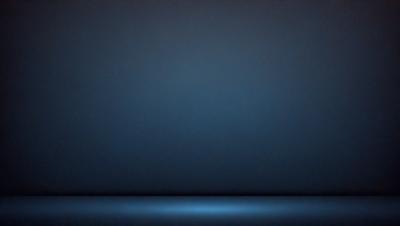 The primary subject of the image is a blue wall. The setting is a dark room, and the visual style is a photo. The dominant colors are blue and black, creating a moody atmosphere.