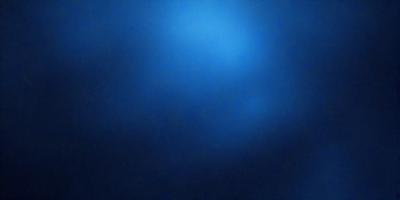 The primary subject of the image is a large body of water, which appears to be a deep blue ocean. The setting is a vast expanse of water, with no visible land or other objects. The visual style of the image is a close-up of the water, showcasing its depth and beauty. The colors and mood of the image are serene and calming, with the deep blue hue evoking a sense of tranquility and vastness.