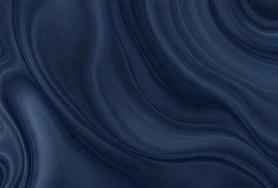 The primary subject of the image is a blue ocean with waves. The setting is the ocean, and the visual style is a photo. The dominant colors are blue and white, creating a calm and serene atmosphere.