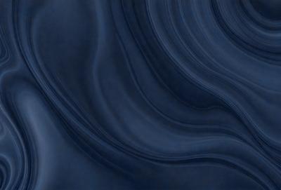 The primary subject of the image is a blue ocean with waves. The setting is the ocean, and the visual style is a photo. The dominant colors are blue and white, creating a calm and serene atmosphere.