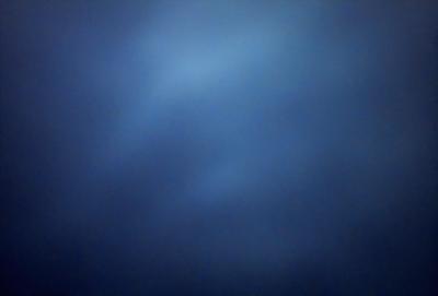 The primary subject of the image is a blue sky with clouds. The setting is a cloudy day, and the visual style is a photo. The dominant colors are blue and white, creating a calm and serene atmosphere.