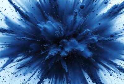 The primary subject of the image is a blue explosion, which appears to be a digital art or illustration. The setting is a blue background, and the visual style is a close-up of the blue explosion. The colors and mood of the image are predominantly blue, creating a sense of depth and intensity.