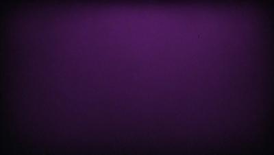 Purple background with a purple dot in the upper right corner.