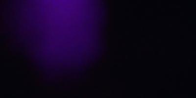 Purple wall, black background, purple and black color scheme.
