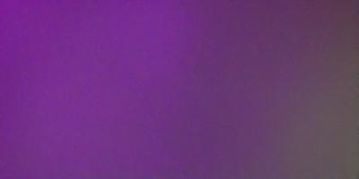 The primary subject of the image is a purple wall. The setting is a room with a purple wall, and the visual style is a photo. The dominant colors in the image are purple and pink, creating a calm and soothing atmosphere.