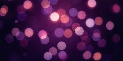 The primary subject of the image is a purple background with a pattern of bright, colorful lights. The lights are scattered throughout the background, creating a visually appealing and vibrant scene. The setting appears to be a dark room, with the lights providing a contrasting and eye-catching effect. The visual style of the image is a combination of digital art and illustration, as the lights are depicted in a way that resembles a digital artwork or an illustration of a starry night. The colors and