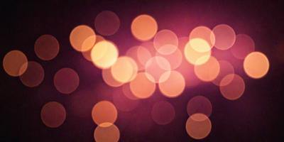 The primary subject of the image is a brightly lit scene with a focus on a pattern of lights. The setting appears to be a dark room, and the visual style is a combination of a photo and digital art. The colors in the image are predominantly orange, creating a warm and inviting atmosphere. The lights in the scene are scattered and illuminated, creating a dynamic and visually engaging environment.