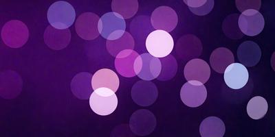 The primary subject of the image is a purple background with a pattern of white circles. The setting appears to be a dark room, and the visual style is a combination of a photo and digital art. The dominant colors are purple and white, creating a calm and serene atmosphere.