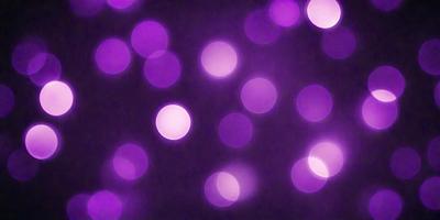 The primary subject of the image is a purple background with a pattern of white circles. The setting is a dark room, and the visual style appears to be a digital art or illustration. The dominant colors are purple and white, creating a calm and serene atmosphere.