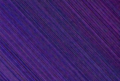 The primary subject of the image is a purple background with a pattern of stripes. The setting is a dark room, and the visual style appears to be a digital art or illustration. The dominant colors are purple and black, creating a moody and dramatic atmosphere.