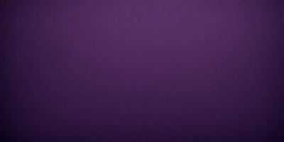 Purple background with no visible objects or textures.