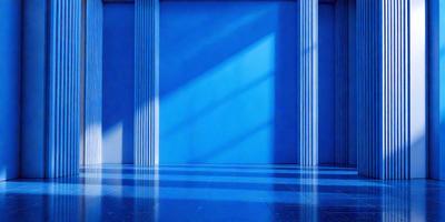 The primary subject of the image is a large blue wall with a row of white columns. The setting is a room with a blue floor, and the visual style is a photo. The dominant colors are blue and white, creating a calm and serene atmosphere.