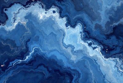 The primary subject of the image is a blue and white swirling pattern, which appears to be a painting or a digital artwork. The setting is a blue background, and the visual style is a combination of photo and digital art. The dominant colors are blue and white, creating a calm and serene atmosphere.