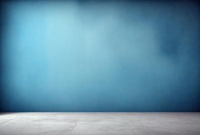 The primary subject of the image is a blue wall with a white floor. The setting is a room with a blue wall and a white floor. The visual style is a photo, and the dominant colors are blue and white. The overall atmosphere is calm and serene.