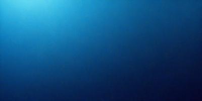 The primary subject of the image is a large body of water, which appears to be a deep blue ocean. The setting is a vast expanse of water, with no visible land or objects in the background. The visual style of the image is a close-up of the water, showcasing its depth and color. The colors and mood of the image are predominantly blue, creating a serene and tranquil atmosphere.
