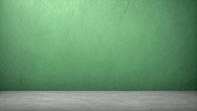 The primary subject of the image is a green wall. The setting is a room with a green wall, and the visual style is a photo. The dominant colors are green, and the overall atmosphere is calm and serene.