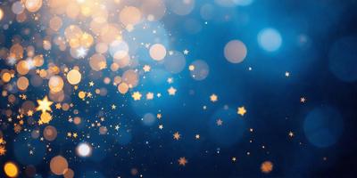 The primary subject of the image is a blue background with a pattern of stars. The setting is a night sky, and the visual style is a digital art or illustration. The dominant colors are blue and gold, creating a serene and peaceful atmosphere.