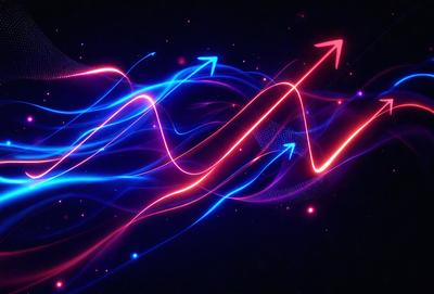 The primary subject of the image is a blue and red light display, which appears to be a digital art or illustration. The setting is a dark background, which contrasts with the bright colors of the light display. The visual style suggests that the image is a creative and artistic representation of light and color. The dominant colors are blue and red, which evoke a sense of energy and excitement.