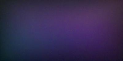 The primary subject of the image is a purple background. The setting is a dark, empty space with no visible objects or people. The visual style appears to be a photo, as it captures the purple hue and the overall atmosphere. The colors and mood of the image are predominantly purple, creating a calm and serene atmosphere.