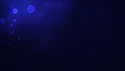 The image features a dark blue sky with a few stars visible. The primary subject is the night sky, which is the main focus of the image. The setting is a vast, open space with no visible landmarks or objects. The visual style is a natural, outdoor scene, likely captured during a nighttime stargazing session. The colors and mood of the image are predominantly dark and serene, with the blue sky and stars creating a peaceful atmosphere.