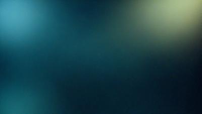 The primary subject of the image is a blue background with a greenish tint. The setting appears to be a dark, moody environment. The visual style is a close-up of the background, which gives a sense of depth and intricacy to the scene. The colors and mood of the image are predominantly dark and mysterious, creating a sense of atmosphere and enhancing the overall aesthetic.