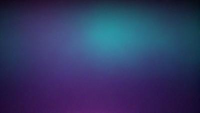 The primary subject of the image is a purple background with a blue hue. The setting is a wall, and the visual style appears to be a digital art or illustration. The dominant colors in the image are purple and blue, creating a calm and serene atmosphere.