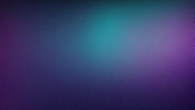 The primary subject of the image is a blue wall with a green tint. The setting is a room with a blue background. The visual style is a photo, and the dominant colors are blue and green. The overall atmosphere is calm and serene.