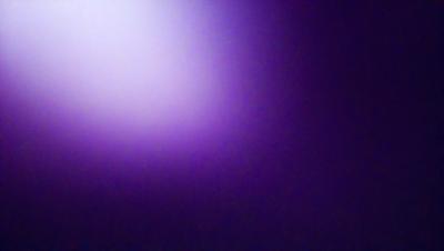 Purple background with a purple light source.