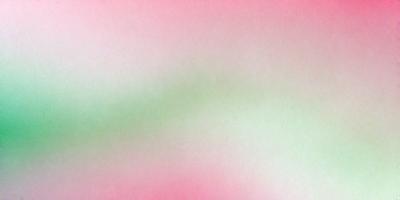 The primary subject of the image is a pink background with a green stripe. The setting is a white wall, and the visual style is a digital art or illustration. The dominant colors are pink and green, creating a warm and vibrant atmosphere.