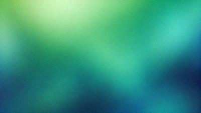 The primary subject of the image is a close-up of a green background, which appears to be a pattern or a texture. The setting is a dark room, and the visual style is a photo. The dominant colors are green and blue, creating a calm and soothing atmosphere.
