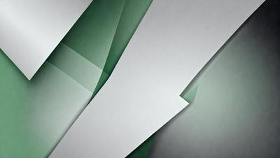 The primary subject of the image is a white paper with a green stripe. The setting is a white background, and the visual style is a close-up of the paper. The colors and mood of the image are predominantly white and green, creating a clean and fresh appearance.