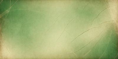 The primary subject of the image is a green wall with a cracked texture. The setting is a room with a green background. The visual style is a close-up of the wall, showcasing its unique texture. The colors and mood of the image are predominantly green, giving it a calm and natural atmosphere.