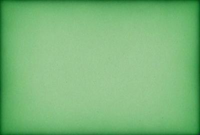 The primary subject of the image is a green background. The setting is a large, empty space with no visible objects or people. The visual style is a close-up of the green background, which appears to be a pattern or texture. The colors and mood of the image are predominantly green, creating a calm and serene atmosphere.