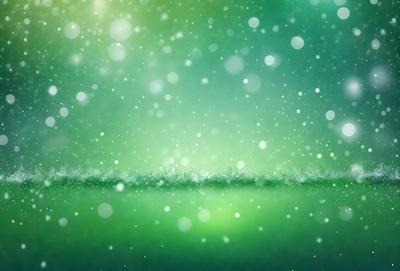 The primary subject of the image is a lush green field covered in snow. The setting is a snowy landscape, and the visual style is a photo. The dominant colors are green and white, creating a serene and peaceful atmosphere.
