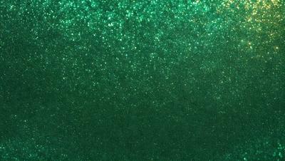 The primary subject of the image is a green background with a pattern of glittering stars. The setting appears to be a dark, starry night, with the green background providing a contrasting backdrop. The visual style of the image is a combination of a photo and digital art, creating a unique and captivating atmosphere. The dominant colors in the image are green and the glittering stars, which contribute to a serene and peaceful mood.