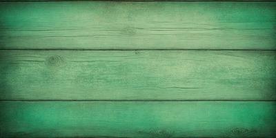 The primary subject of the image is a green wooden wall. The setting is a room with a green wooden wall, and the visual style is a photo. The dominant colors are green, and the overall atmosphere is calm and natural.