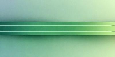 The primary subject of the image is a green background. The setting is a green wall, and the visual style is a photo. The colors and mood of the image are predominantly green, creating a calm and serene atmosphere.
