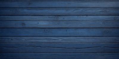 The primary subject of the image is a wooden wall with a blue background. The setting is a room with a blue wall, and the visual style is a photo. The dominant colors are blue and brown, creating a calm and soothing atmosphere.